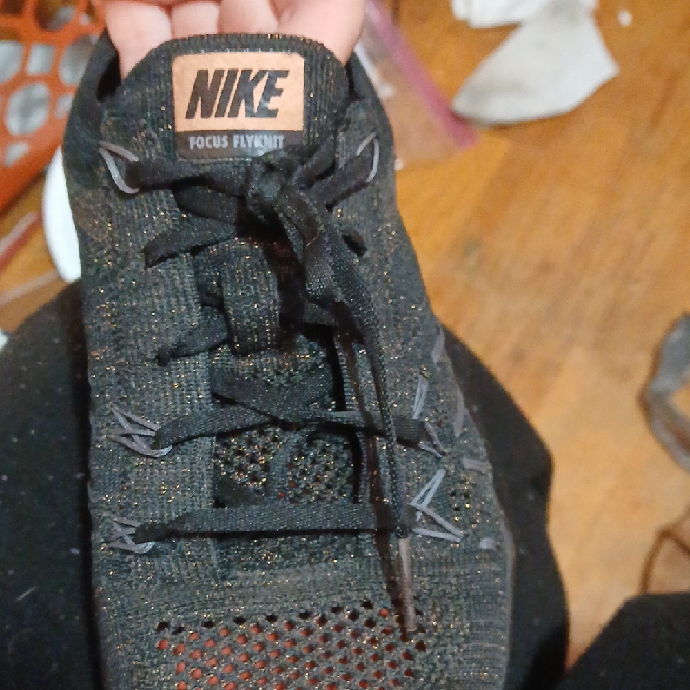 Nike Black and Gold Flyknit Shoes